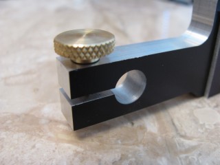Detail of indicator holder showing hole bored for indicator barrel, slot and knurled brass tightening screw