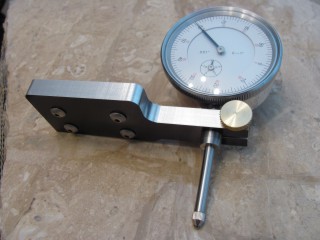 Dial indicator holder with dial indicator clamped in it