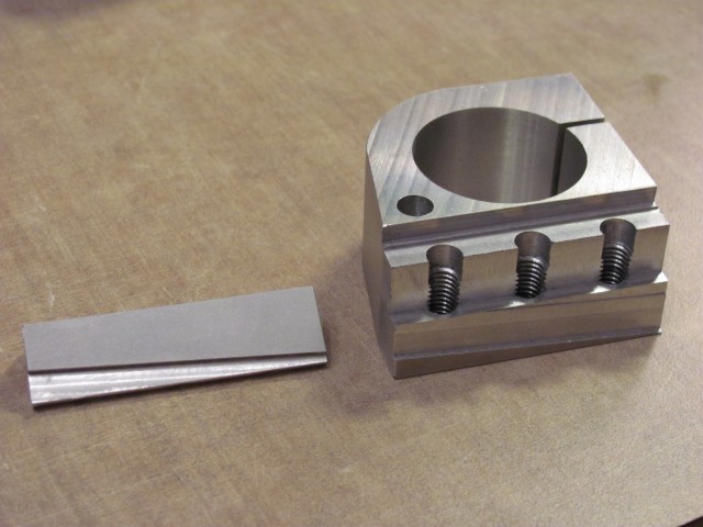 Parting blade clamp and tool holder